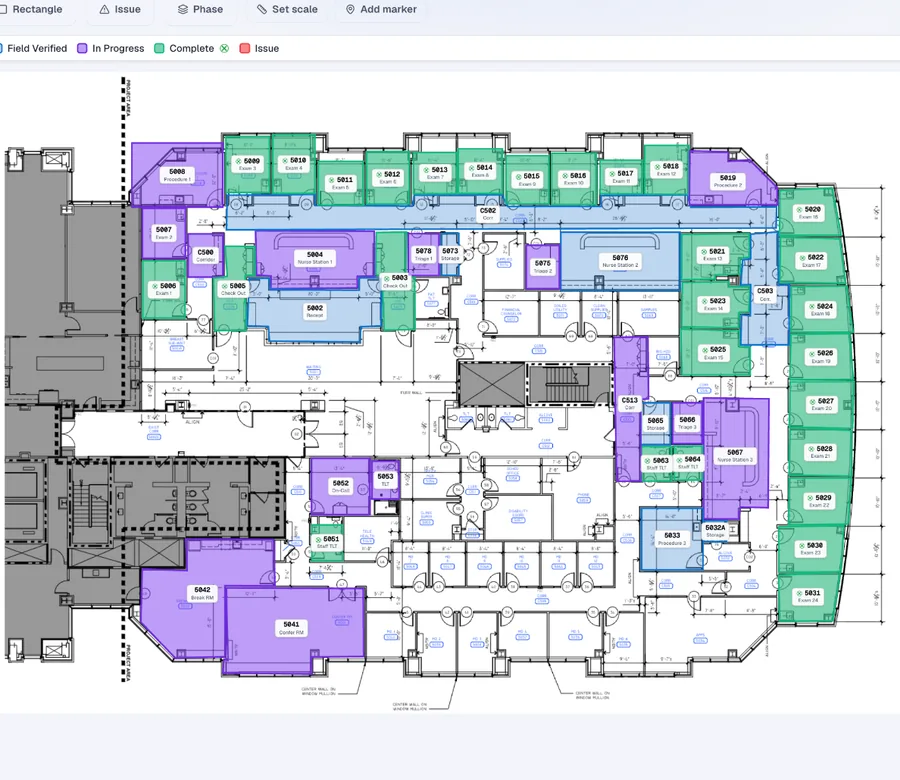 Praxon floor plan with every room color coded by field status across a full building level.